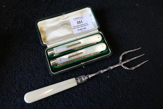 Victorian travelling silver knife and fork in case and a Victorian small toasting fork